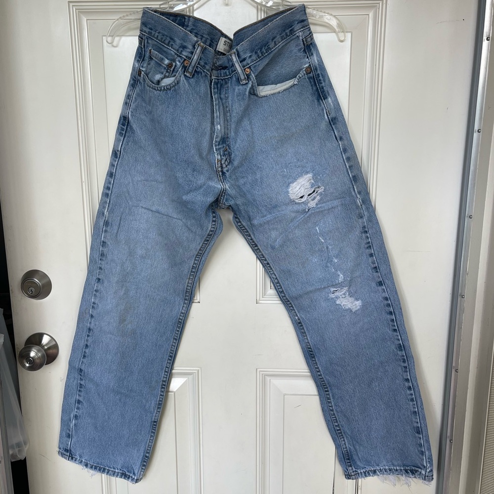 vintage light wash distressed levi’s 505 straight jeans